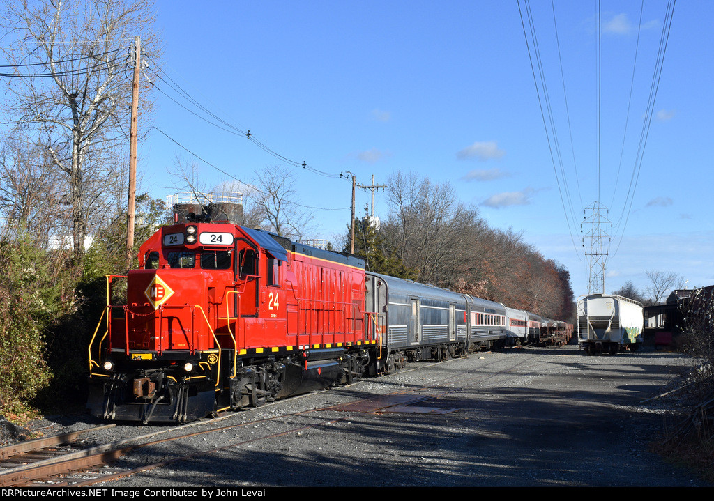 GP15-1 # 24 is on the point of the Polar Express train as it is about to cross Troy Hills Rd in Hanover Twp